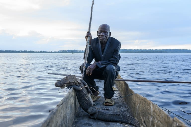 Papa Baron Missiki, 91, talks of his days hunting crocodiles on the Congo River (Arsene Mpiana)