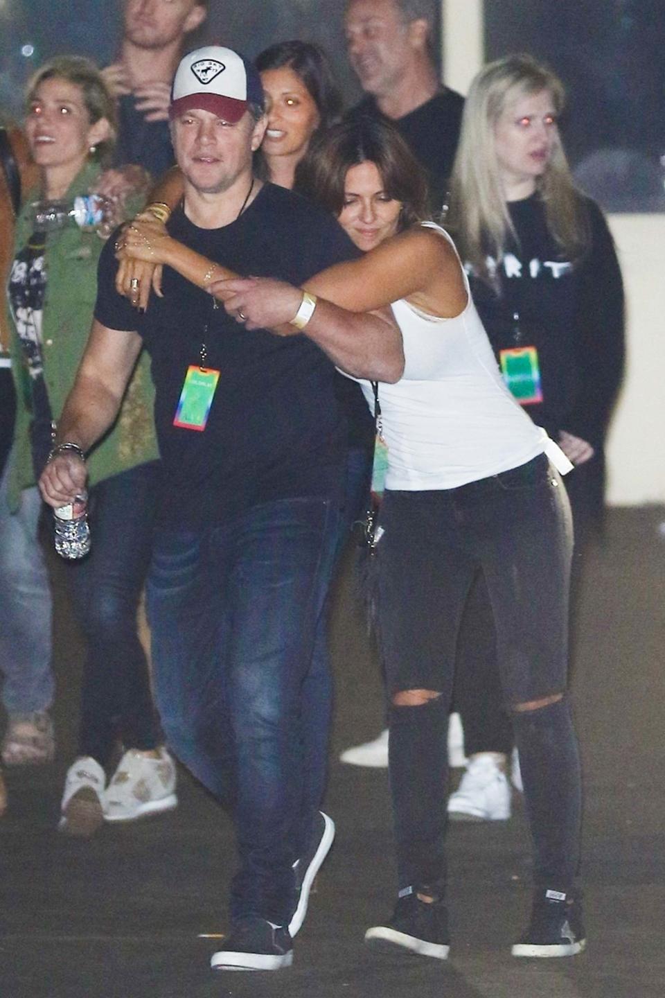The cute couple couldn't keep their hands off each other at a Coldplay concert over the weekend.