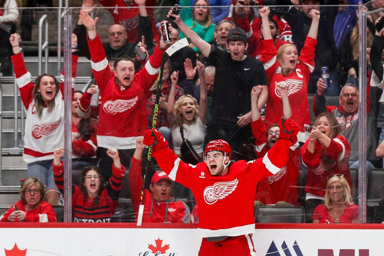 Detroit Red Wings right wing Alex DeBrincat (93) celebrates scoring a goal against Montreal Canadiens during the third period at Little Caesars Arena in Detroit on Monday, April 15, 2024.