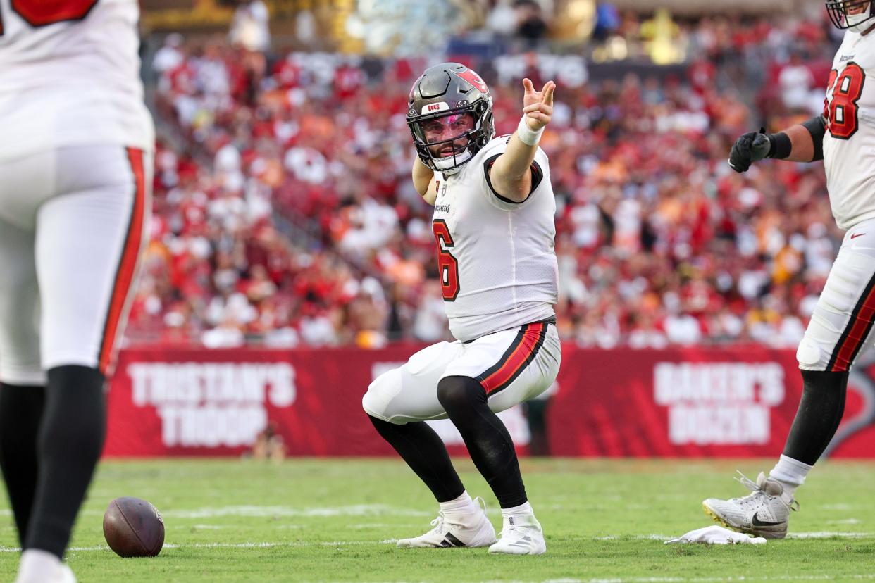 Sep 8, 2024; Tampa, Florida, USA; Tampa Bay Buccaneers quarterback Baker Mayfield (6) reacts after a first down against the Washington Commanders in the fourth quarter at Raymond James Stadium. Mandatory Credit: Nathan Ray Seebeck-Imagn Images