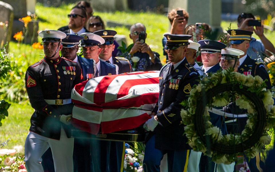 Pallbearers carry the coffin of late Congresswoman Jackie Walorski during her burial service at Southlawn Cemetery, Thursday, Aug. 4, 2022, in South Bend, Ind. Political leaders on Thursday honored Republican U.S. Rep. Walorski of Indiana as a determined advocate for her beliefs during a funeral after she and three other people were killed in a highway crash last week.