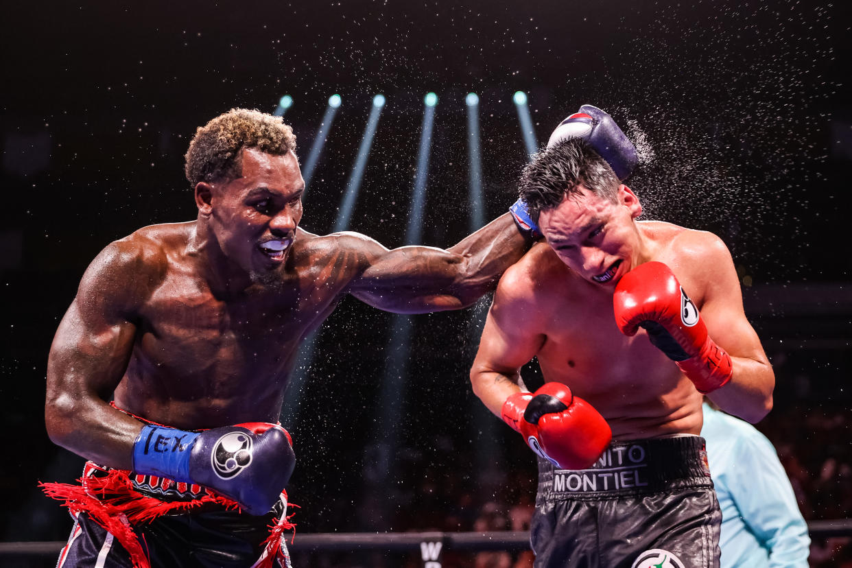 HOUSTON, TEXAS - JUNE 19: Jermall Charlo and Juan Macias Montiel exchange punches during their WBC middleweight title fight at Toyota Center on June 19, 2021 in Houston, Texas. (Photo by Carmen Mandato/Getty Images)