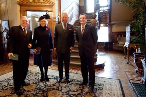 Kevin Nolan (left) and Robert Hall (right) are pictured at Ryan Mansion in St. John's with Prince Charles and his wife Camilla during a royal visit in 2009.  (Source: www.ryanmansion.com - image credit)