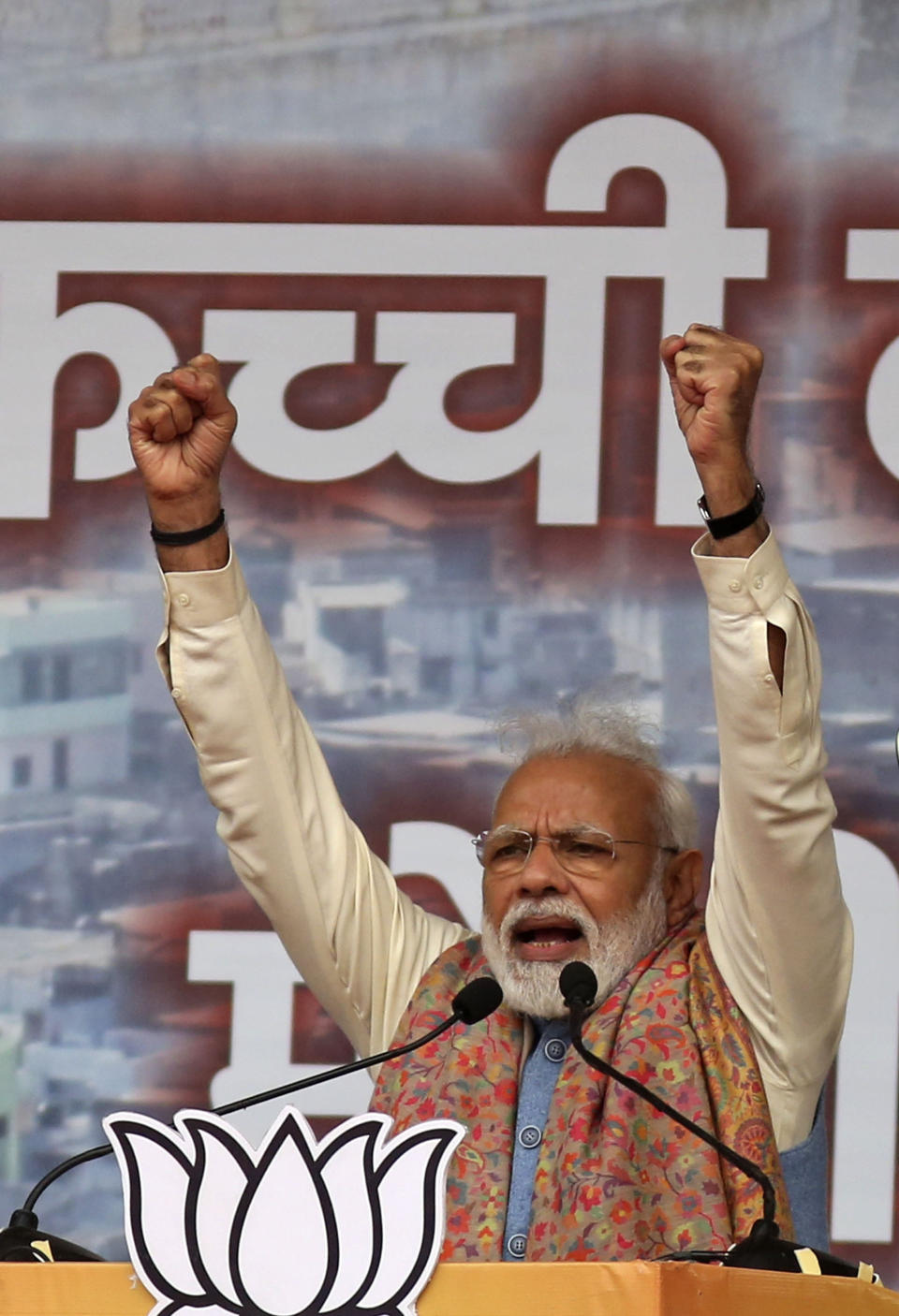 Indian Prime Minister Narendra Modi addresses a rally of his Hindu nationalist Bharatiya Janata Party in New Delhi, India, Sunday, Dec. 22, 2019. Clashes continued Sunday between Indian police and protesters angered by a new citizenship law that excludes Muslims, as Modi used the rally to defend the legislation, accusing the opposition of pushing the country into a "fear psychosis." (AP Photo)