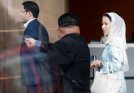 Nooryana Najwa Najib accompanies her mother Rosmah Mansor, the wife of former Malaysian prime minister Najib Razak, to the Malaysian Anti-Corruption Commission (MACC) in Putrajaya, Malaysia June 5, 2018. REUTERS/Lai Seng Sin