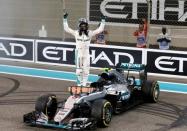 Formula One - F1 - Abu Dhabi Grand Prix - Yas Marina Circuit, Abu Dhabi, United Arab Emirates - 27/11/2016 - Mercedes' Formula One driver Nico Rosberg of Germany celebrates after winning the Formula One world championship. REUTERS/Ahmed Jadallah