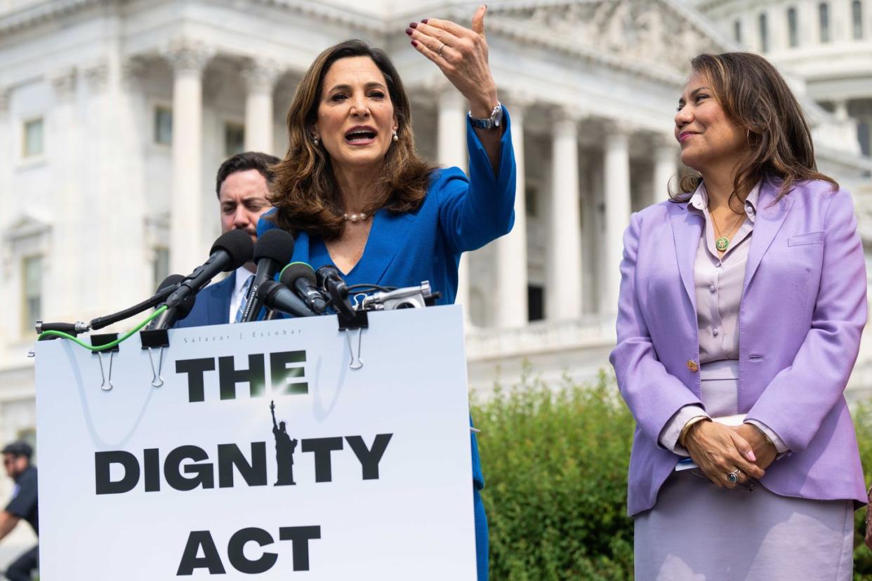 rep maria elvira salazar as veronica escobar listens during their news conference to introduce the dignity act immigration bill