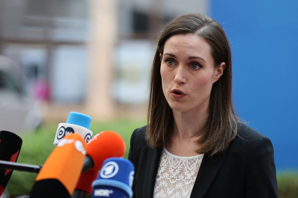 Finland’s Prime Minister Sanna Marin speaks to the press as she arrives for a European Union (EU) summit at EU Headquarters in Brussels on March 24, 2022.  (AFP via Getty Images)