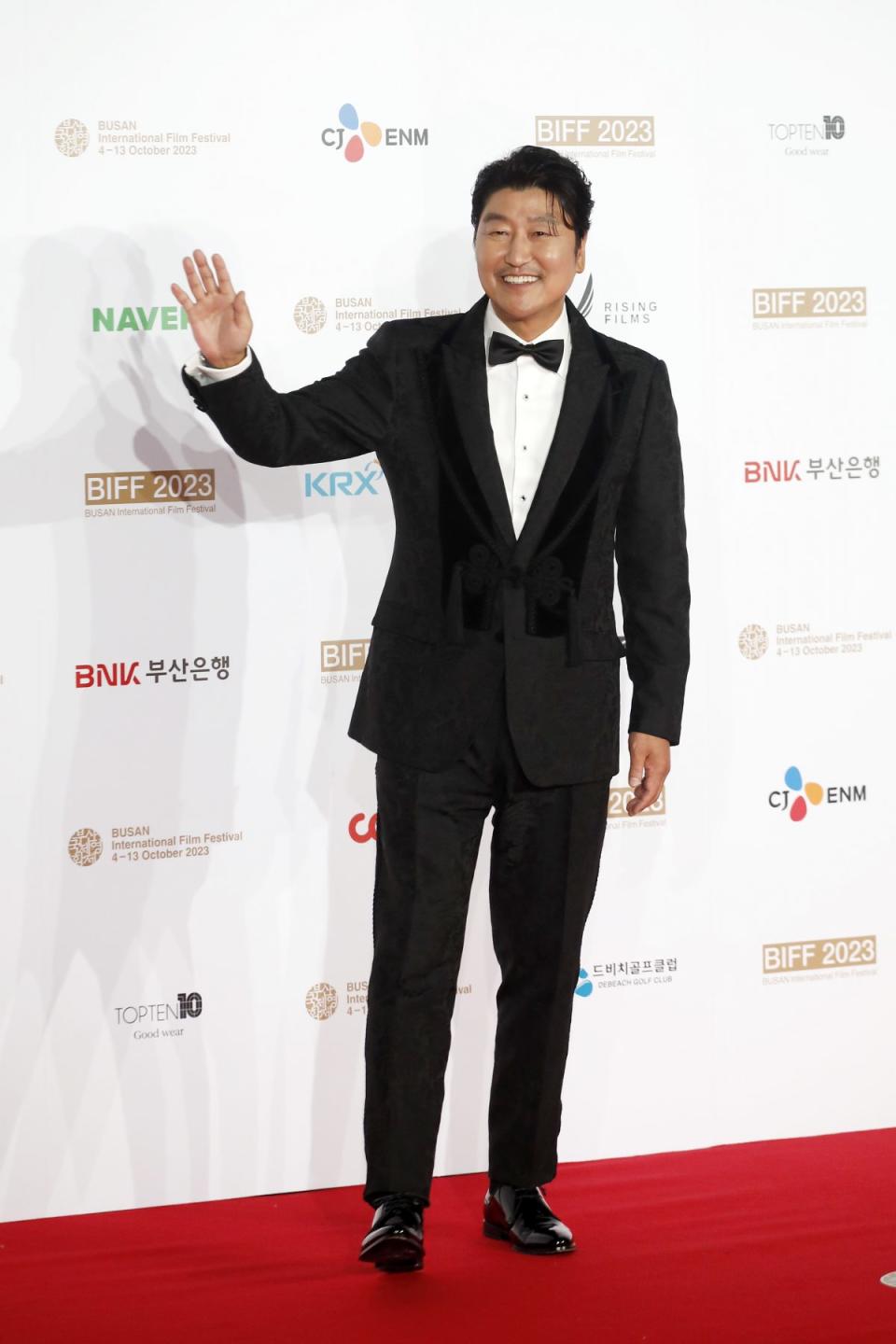 BUSAN, SOUTH KOREA - OCTOBER 04: Song Kanh-ho arrives for the Opening Ceremony of the 28th Busan International Film Festival at Busan Cinema Center on October 04, 2023 in Busan, South Korea. (Photo by Woohae Cho/Getty Images)