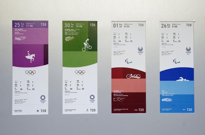 FILE PHOTO : The ticket designs for the 2020 Tokyo Olympics and Paralympics are seen displayed for the media for a photo opportunity in Tokyo, Japan
