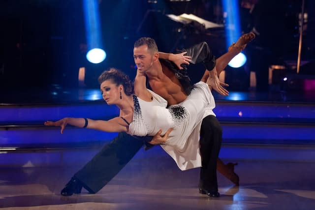 Kara Tointon and Artem Chigvintsev performing in the 2010 Strictly Come Dancing final (Guy Ley/PA)