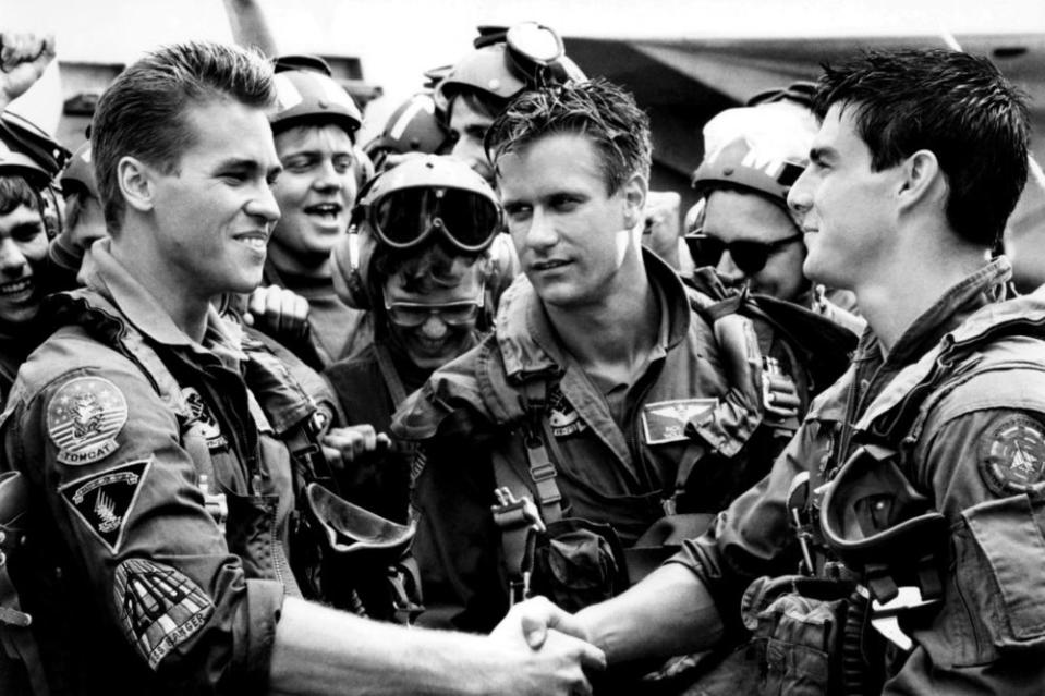 Val Kilmer, Barry Tubb, Tom Cruise in <em>Top Gun</em>