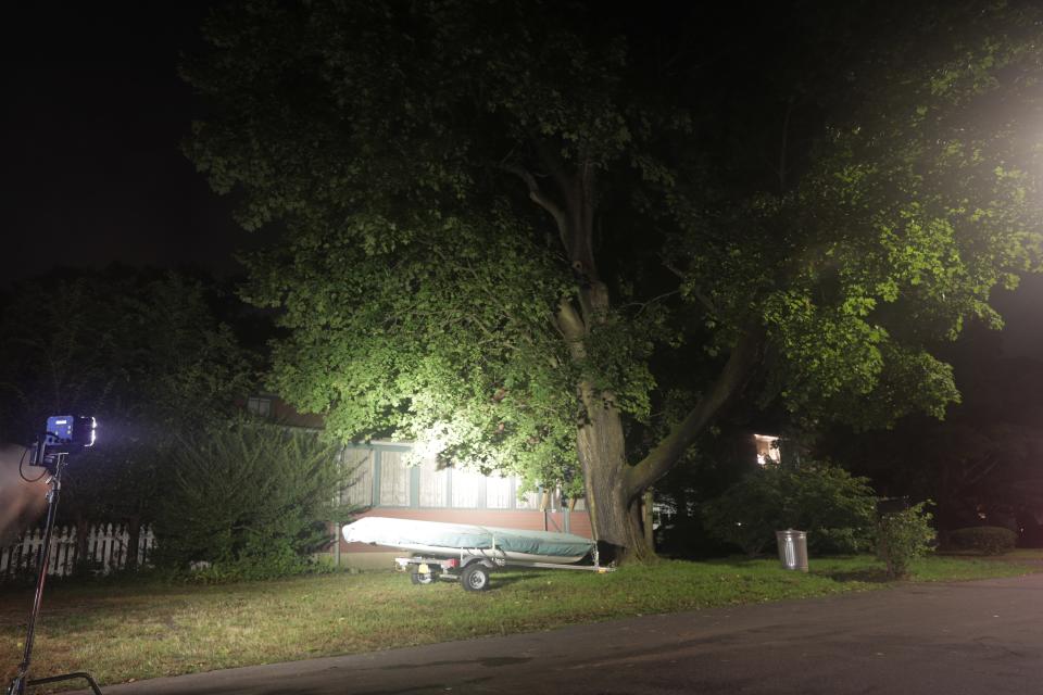 Media lights show the home of Paul Rosenfeld is shown Wednesday, Oct. 10, 2018, in Tappan, N.Y. Federal authorities have charged Rosenfeld with building a 200-pound (90-kilogram) bomb that he planned to detonate on Election Day on the National Mall in Washington. (AP Photo/Frank Franklin II)