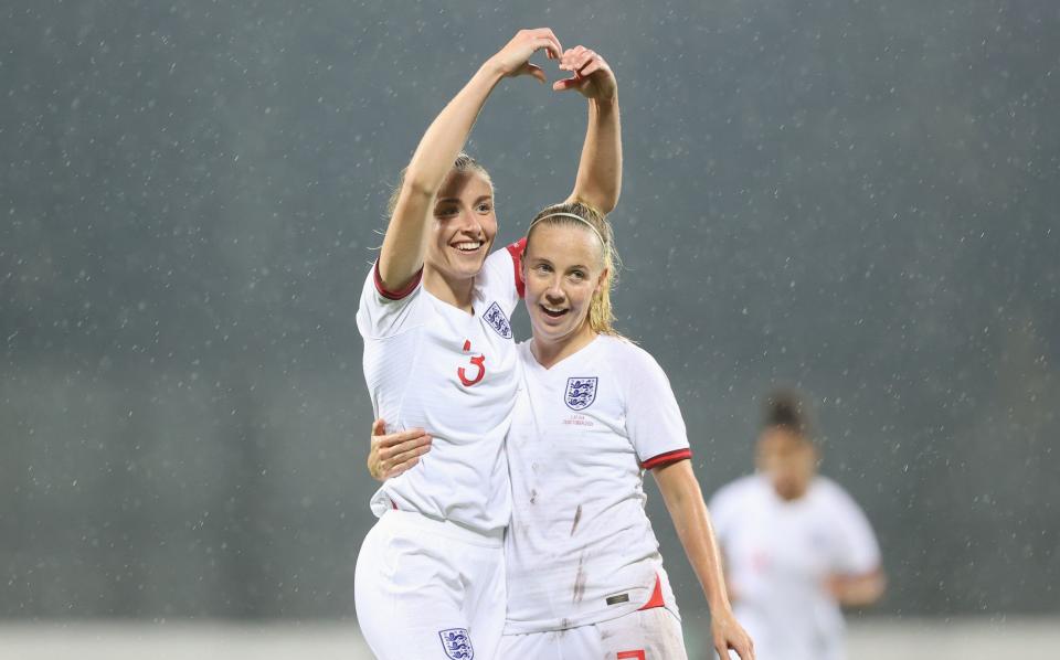  Leah Williamson of England celebrates with teammate Beth Mead after scoring her team's eighth goal during the FIFA Women's World Cup 2023 Qualifier group D match between Latvia and England at on October 26, 2021 in Riga , Latvia - GETTY IMAGES