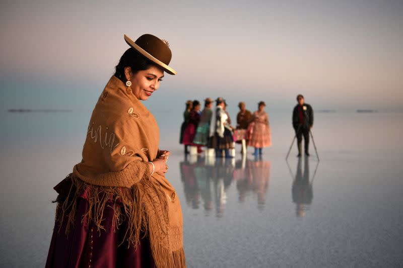 Uyuni Salt Flat attracts photo-seeking tourists, in Bolivia