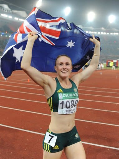 Australia's Sally Pearson celebrates her win in the women's 100m hurdles final of the Track and Field competition of the XIX Commonwealth games, in October 2010, in New Delhi. Pearson believes she is a more confident hurdler since becoming world champion, and is adamant she will handle the daunting pressure as the gold medal favourite at the London Games