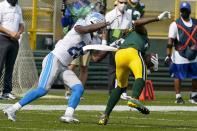 Detroit Lions' Will Harris is called for a horsecollar penalty on his tackle of Green Bay Packers' Davante Adams during the first half of an NFL football game Sunday, Sept. 20, 2020, in Green Bay, Wis. (AP Photo/Morry Gash)