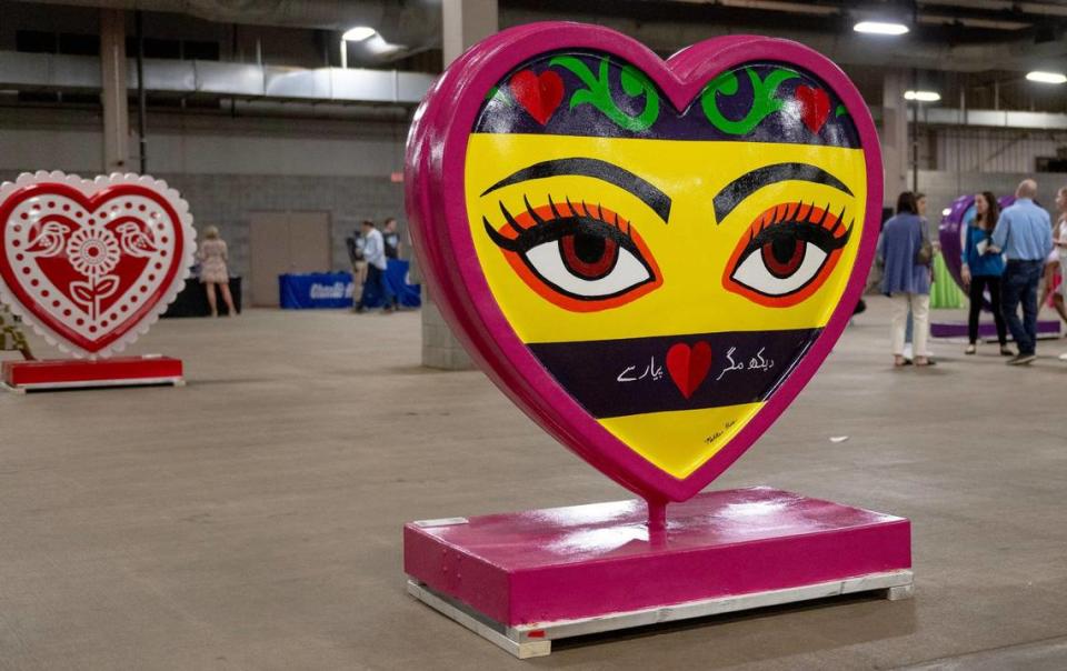 “Look, But Only With Love” by artist Maliha Khan is one of 40 hearts that make up the 2023 season of The Parade of Hearts. Nick Wagner/nwagner@kcstar.com