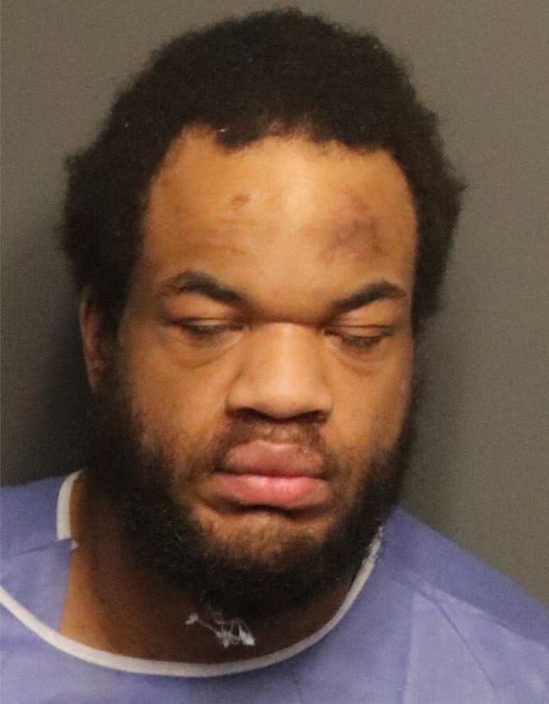 The suspect’s mugshot from a prior arrest.