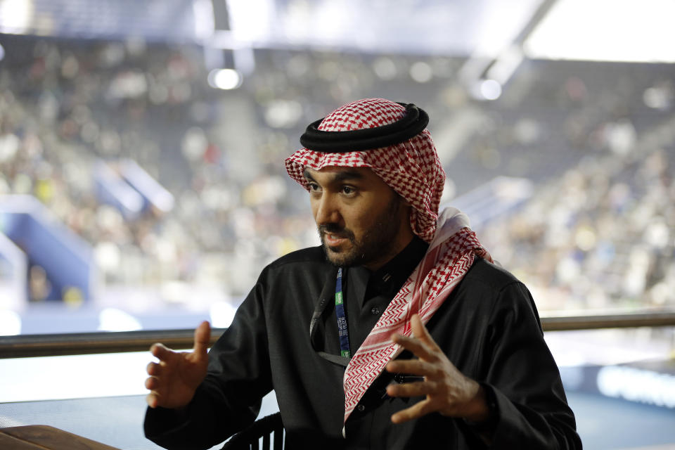In this Friday, Dec. 13, 2019 photo, Prince Abdulaziz bin Turki al-Faisal, who leads the General Sports Authority, speaks during an interview with the Associated Press in Riyadh, Saudi Arabia. The Prince said that he invites anyone who's interested or curious about Saudi Arabia to come and visit the country after it opened tourist visas to people from around the world three months ago.(AP Photo/Amr Nabil)