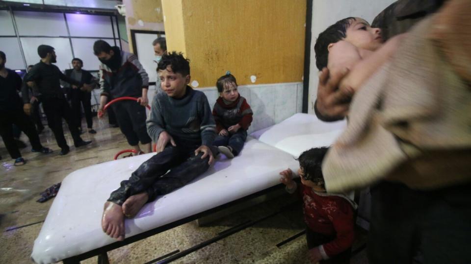 <p>Affected Syrian kids wait to receive medical treatment after Assad regime forces allegedly conducted poisonous gas attack to Duma town of Eastern Ghouta in Damascus, Syria on April 7, 2018. (Photo: Fadi Abdullah/Anadolu Agency/Getty Images) </p>