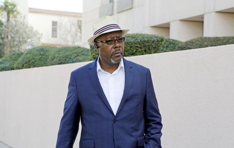 Gregory Clayborn, the father of one of those killed, speaks to reporters after Enrique Marquez Jr. pleaded guilty to providing the high-powered rifles used to kill 14 people in the San Bernardino terror attack, in federal court in Riverside, Calif., Thursday, Feb. 16, 2017. The judge accepted his plea agreement with prosecutors. Clayborn opposed the plea agreement in remarks to the judge before the hearing. (AP Photo/Reed Saxon)