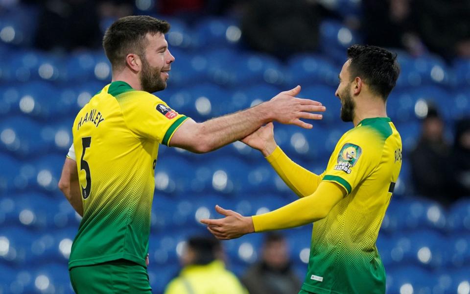 Grant Hanley, left, scored Norwich's opening goal  - REUTERS