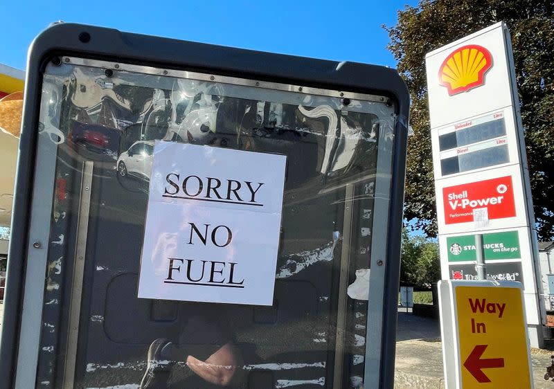 A sign informs customers that fuel has run out at a petrol station in Hemel Hempstead