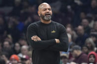 Cleveland Cavaliers head coach J.B. Bickerstaff looks on in the first half of an NBA basketball game against the Sacramento Kings, Monday, Feb. 5, 2024, in Cleveland. (AP Photo/Sue Ogrocki)