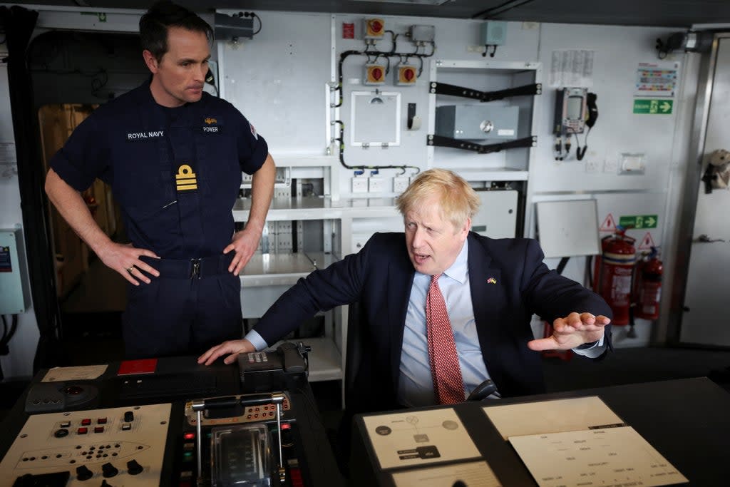 Boris Johnson sits on the bridge of HMS Dauntless during a visit to the Cammell Laird shipyard in Merseyside (Phil Noble/PA) (PA Wire)