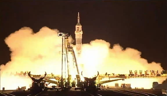 The Soyuz TMA-16M spacecraft launches, carrying the 1-year mission crew to the International Space Station, March 27, 2015 in Baikonor, Kazakhstan.