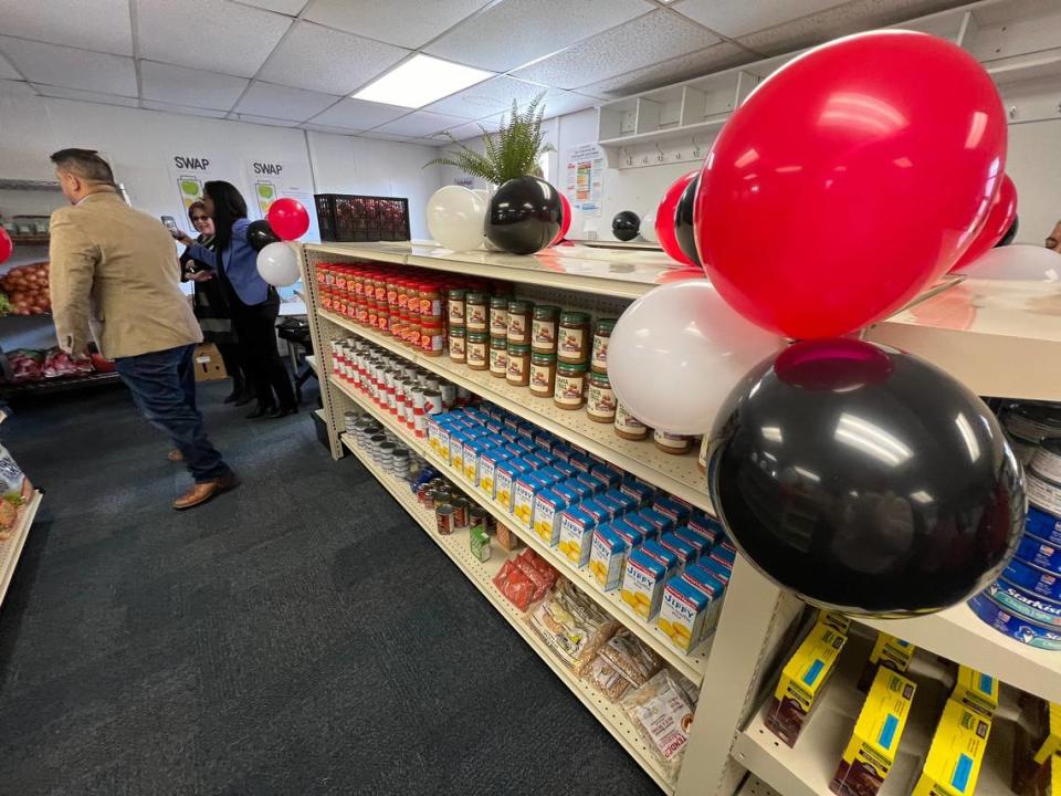 Peanut butter and other nonperishable groceries line shelves at the opening of the Viking Market at Morningside Middle School in Fort Worth on Tuesday, Feb. 6, 2024.