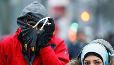 Migrants arrive at the the Berlin Office of Health and Social Affairs (LAGESO), in Berlin, Germany, January 5, 2016. REUTERS/Hannibal Hanschke