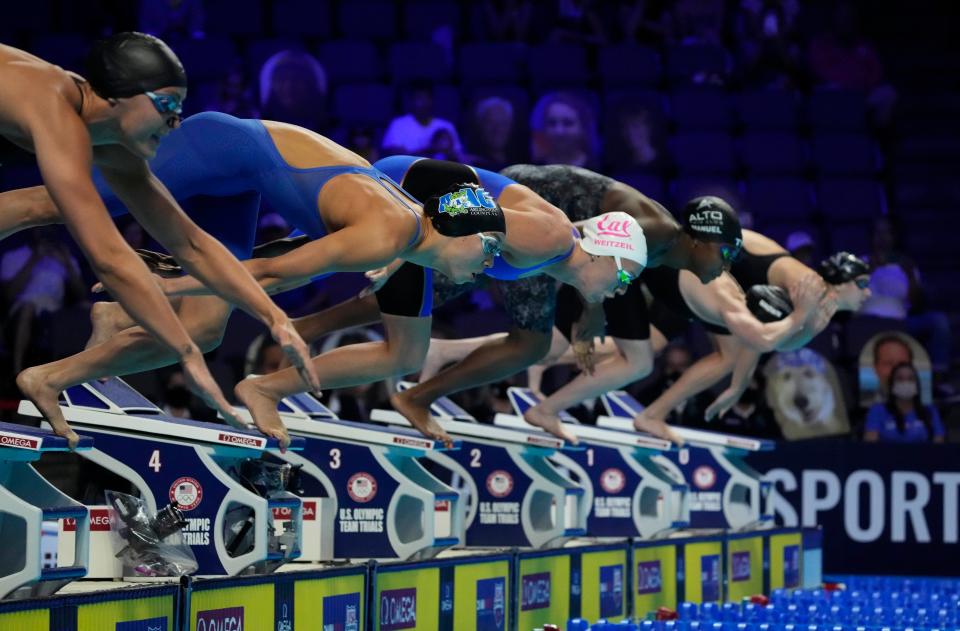 Torri Huske (second from left) dives in at the start of the women's 50m freestyle final during the 2021 U.S. Olympic Team Trials Swimming competition at CHI Health Center Omaha. The 2024 Trials are scheduled for Indianapolis.