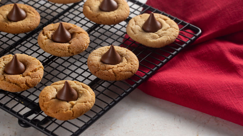 Peanut butter blossoms on wire rack