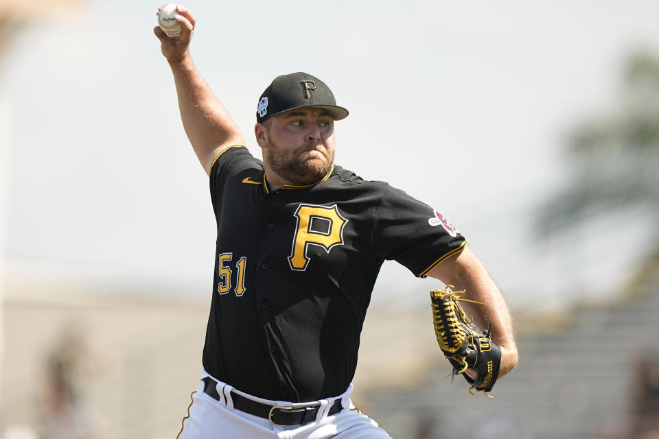 Pittsburgh Pirates relief pitcher David Bednar (51) delivers during a spring training baseball game against the Baltimore Orioles, Tuesday, Feb. 28, 2023, in Bradenton, Fla. (AP Photo/Brynn Anderson)