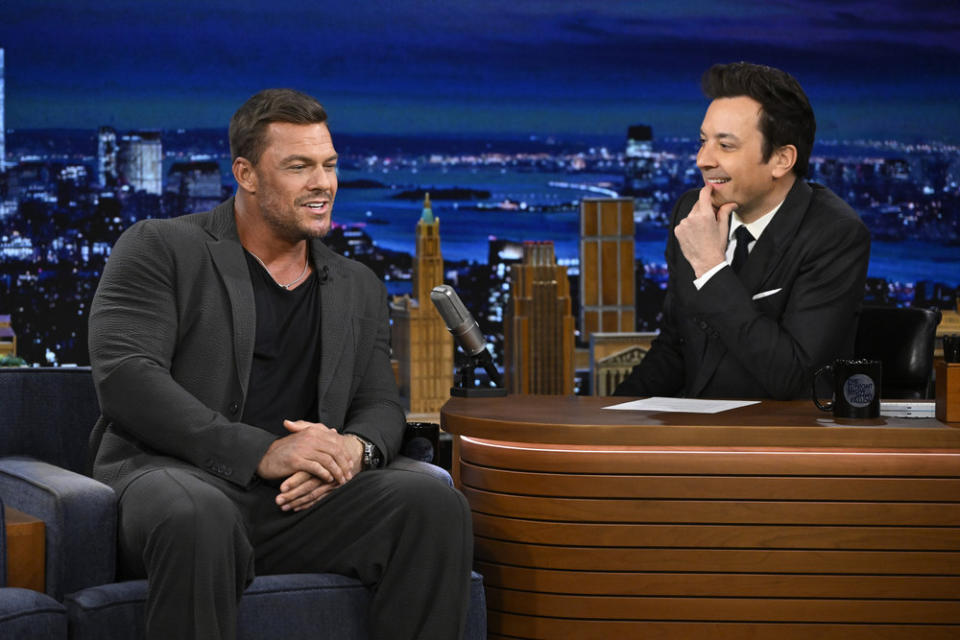 THE TONIGHT SHOW STARRING JIMMY FALLON -- Episode 1926 -- Pictured: (l-r) Actor Alan Ritchson during an interview with host Jimmy Fallon on Friday, February 16, 2024 -- (Photo by: Todd Owyoung/NBC)