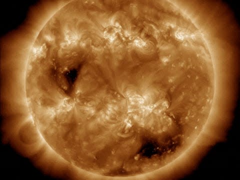 Solar coronal hole is shown on this gif of a rotating Earth.