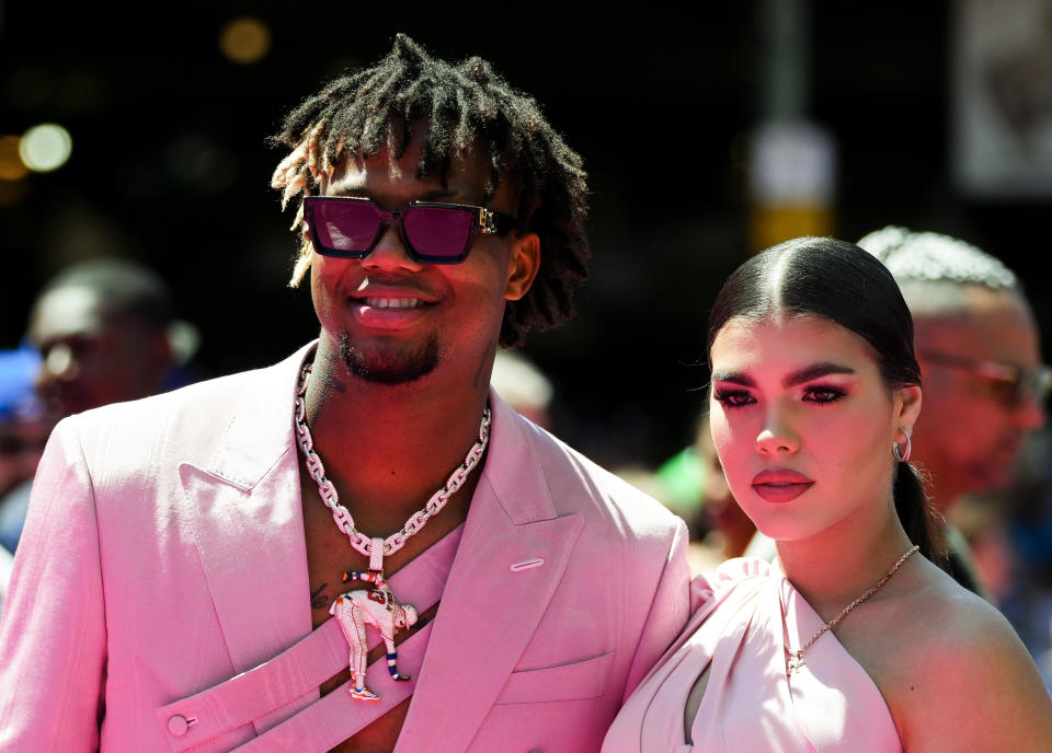 Atlanta Braves' Ronald Acuña Jr. walks with fiancee Maria Laborde during the baseball All-Star Game red carpet show Tuesday, July 11, 2023, in Seattle. (AP Photo/Lindsey Wasson)