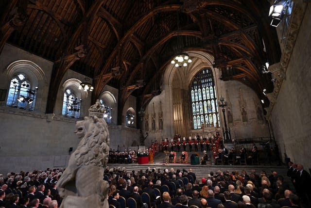 King Charles III and the Queen Consort listen to Speaker of the House of Lords Lord McFall of Alcluith at Westminster Hall, London 