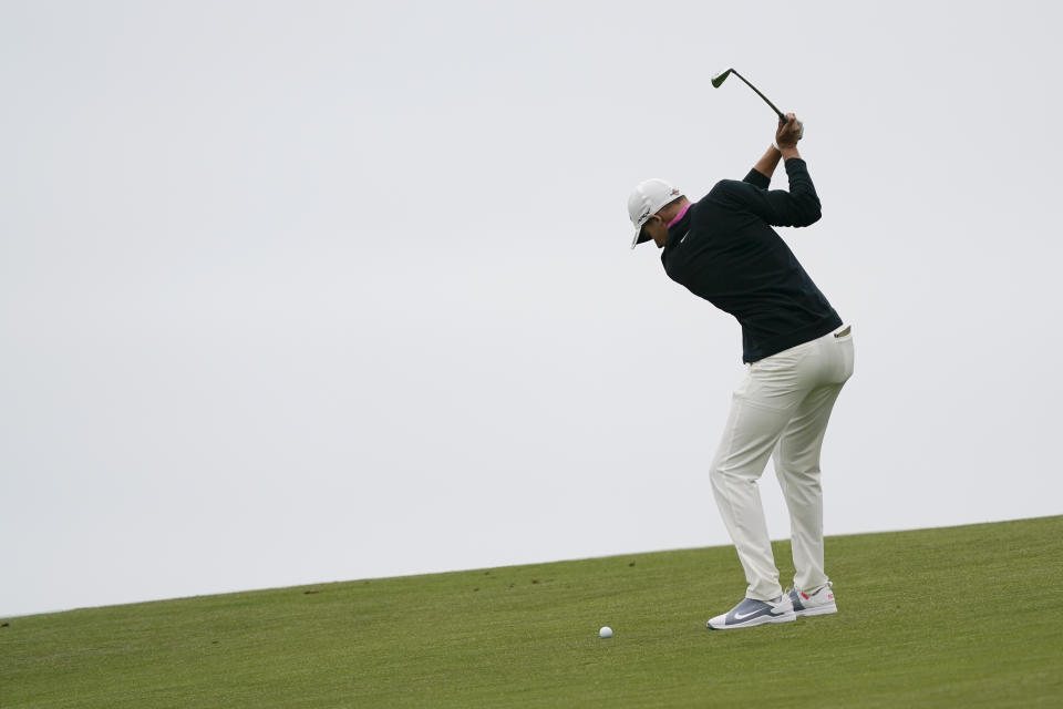Aaron Wise hits from the fairway on the ninth hole during the first round of the U.S. Open Championship golf tournament Thursday, June 13, 2019, in Pebble Beach, Calif. (AP Photo/David J. Phillip)