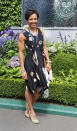 <p>Dressed in a printed dress, which showed off her athletic frame, Dame Kelly was dressed for summer during her moment at Wimbledon.<i> [Photo: PA Images]</i></p>