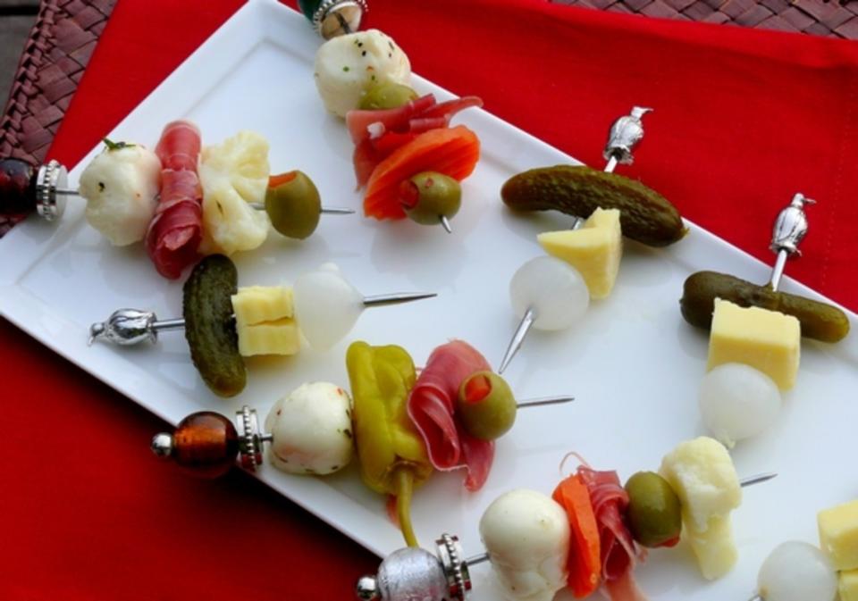 <p>Noble Pig</p><p>All the favorites from a big grazing board, but in one tasty bite.</p><p><strong>Get the recipe: <a href="https://noblepig.com/2011/11/antipasto-and-cheddar-pickle-skewers/" rel="nofollow noopener" target="_blank" data-ylk="slk:Antipasto Cheddar Pickle Skewers;elm:context_link;itc:0;sec:content-canvas" class="link ">Antipasto Cheddar Pickle Skewers</a></strong></p><p><strong>Related: <a href="https://parade.com/1160711/nettiemoore/best-food-boards/" rel="nofollow noopener" target="_blank" data-ylk="slk:31 Pinterest Worthy Food Boards;elm:context_link;itc:0;sec:content-canvas" class="link ">31 Pinterest Worthy Food Boards</a></strong></p>
