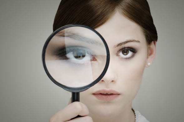 girl with magnifying glass