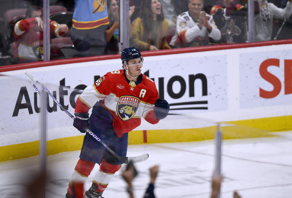 Florida Panthers left wing Matthew Tkachuk celebrates his goal against the Carolina Hurricanes during the first period of an NHL hockey game Friday, Nov. 10, 2023, in Sunrise, Fla. (AP Photo/Michael Laughlin)