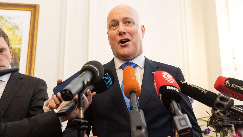 New Zealand's new Prime Minister Christopher Luxon speaks to the media during the swearing-in of the new government at Government House in Wellington on November 27, 2023. - Marty Melville/AFP/Getty Images