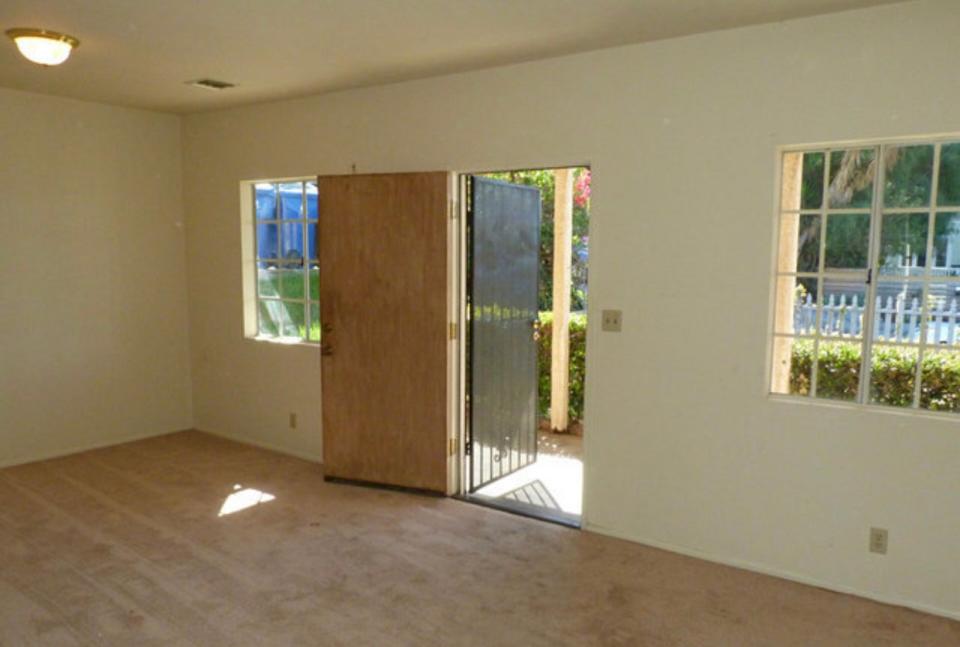 BEFORE: Prior to the renovation, windows were sparse in the home—originally built in 1922.