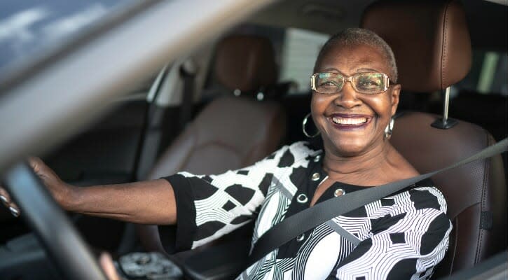 Woman driving a car.