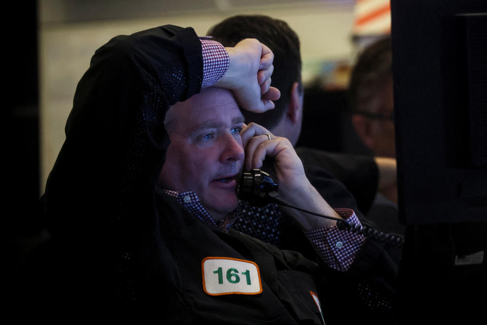 Traders work on the floor of the New York Stock Exchange (NYSE) in New York City, U.S., October 14, 2022. REUTERS/Brendan McDermid