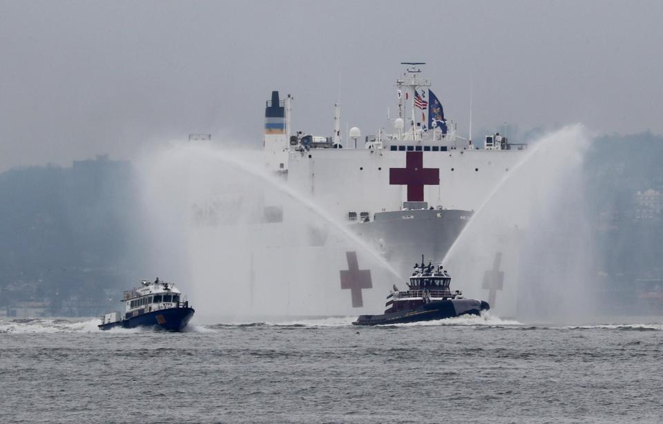 The U.S. Navy Hospital Ship Comfort makes its way up New York Harbor March 30, 2020 as it sails into New York City to aid in the city's battle with the coronavirus. The ship will provide 1000 hospital beds to make room in city hospitals for COVID-19 patients.